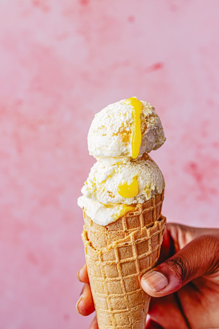 holding mango ice cream