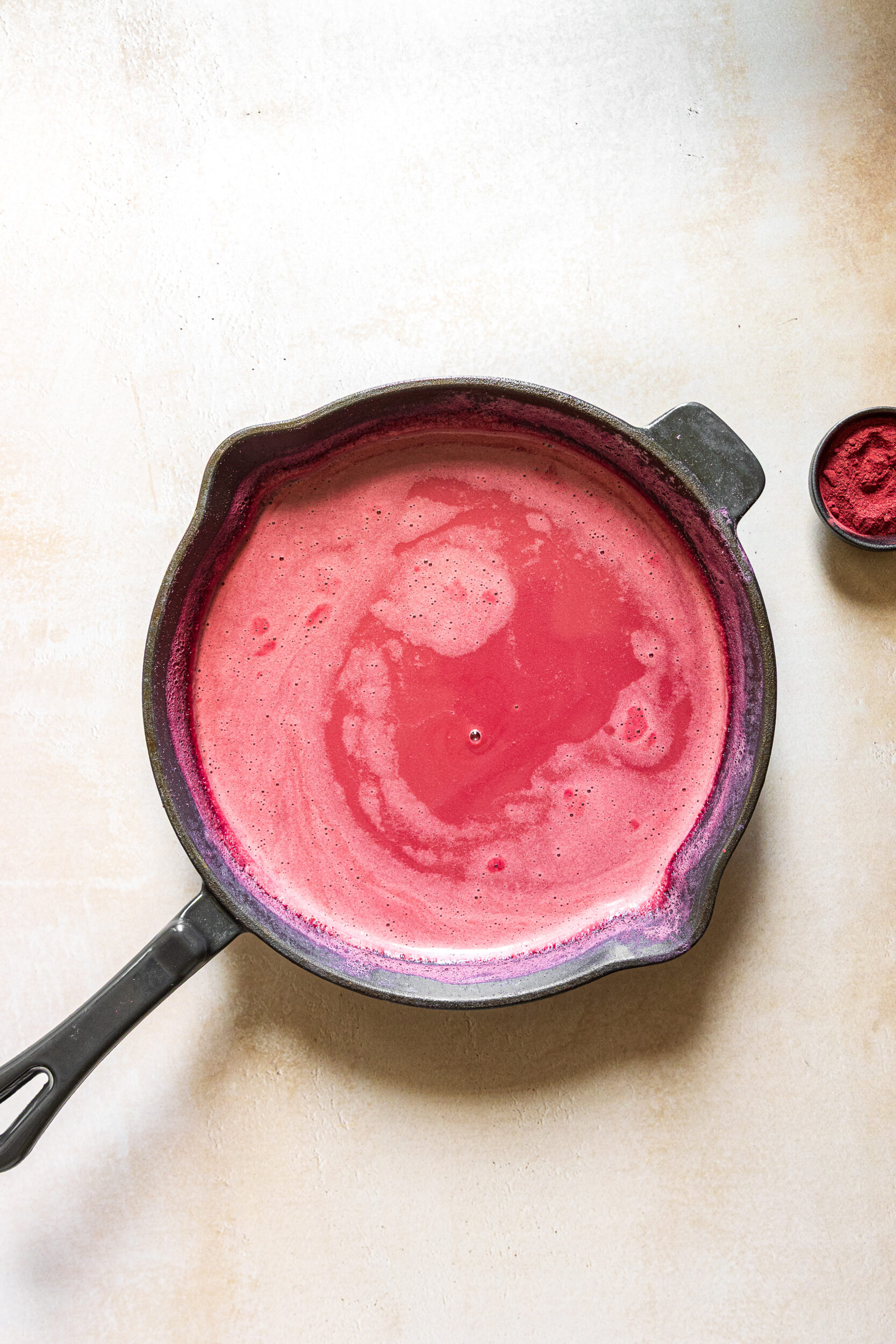 Hibiscus latte in a saucepan
